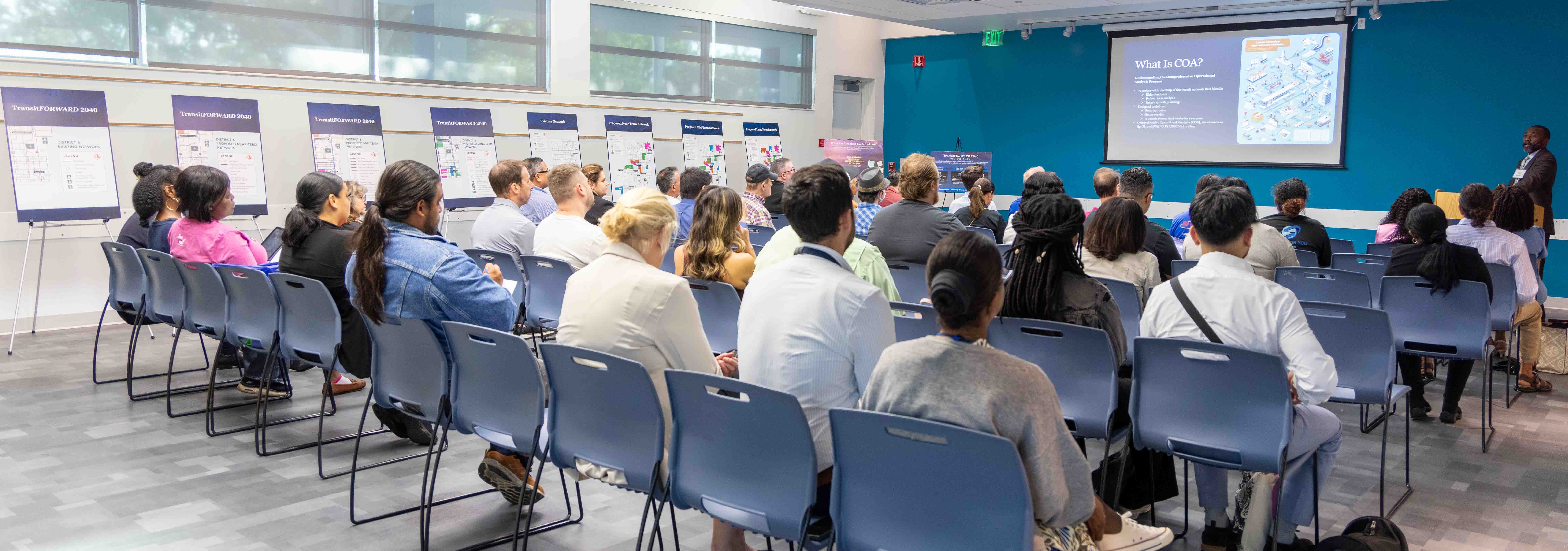 Full auditorium ready to learn about TransitFORWARD 2040 vision plan 