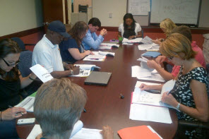 Community leaders meet with Broward County Vice Mayor Barbara Sharief, top center, to discuss measures to reduce aggressive dogs.