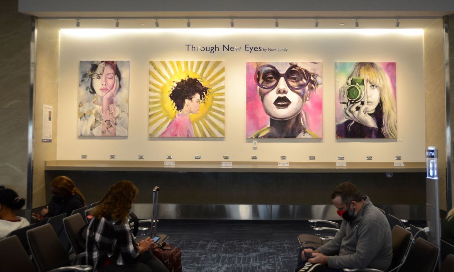 The new Terminal 2 Art Gallery opens with the inaugural "Through New Eyes" exhibit.